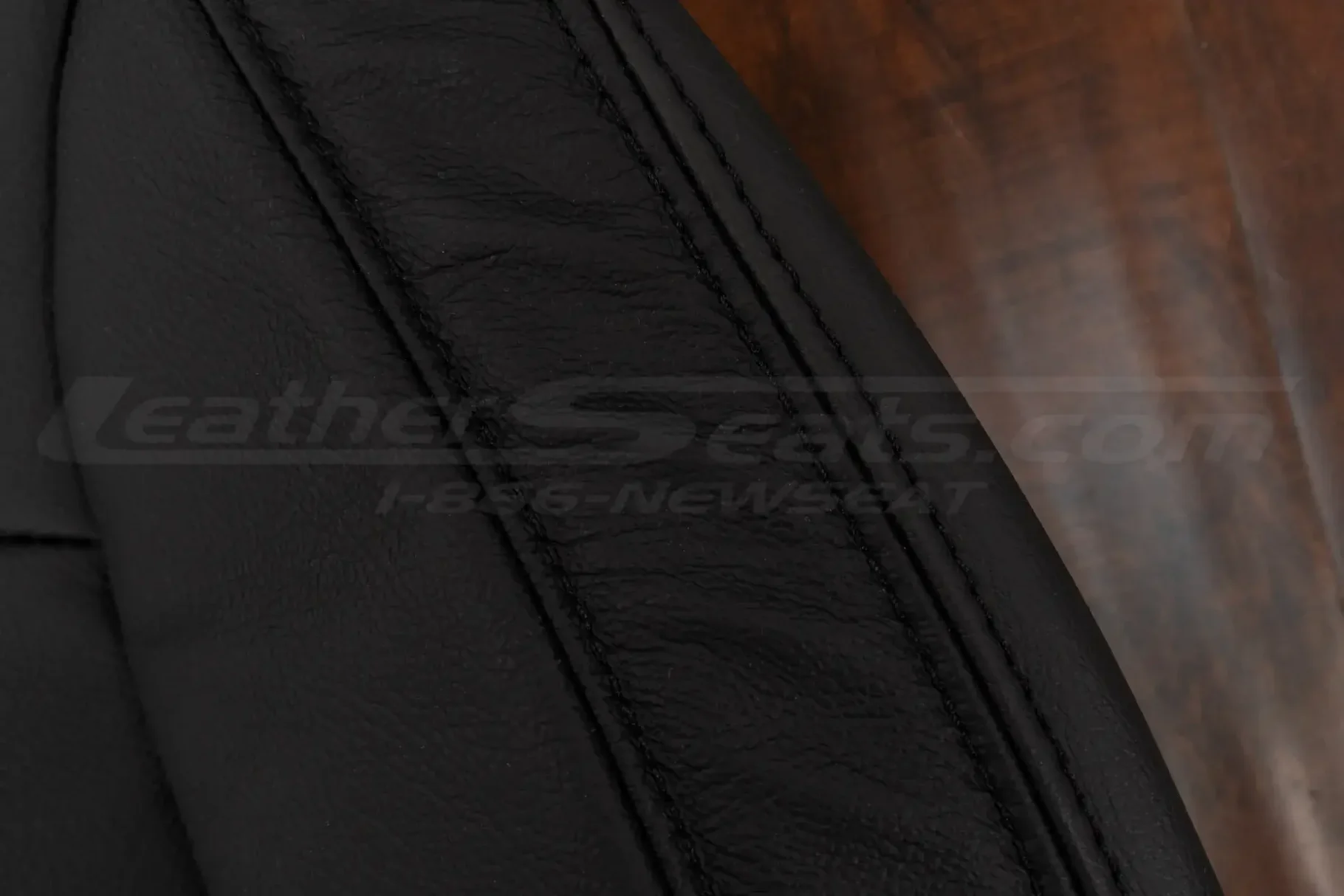 Matching Black stitching on Black leather side bolster