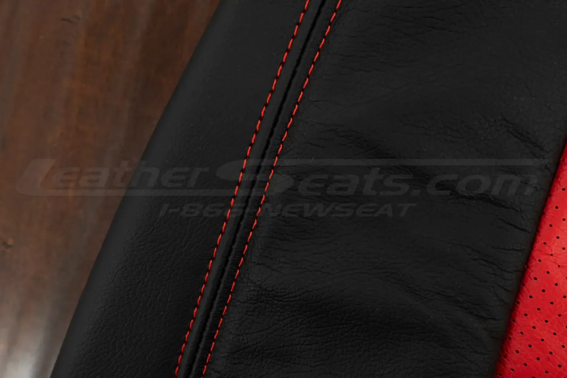 Bright Red stitching on black leather