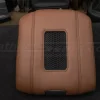 Cocoa leather charging console with dark graphite stitching and trim ring