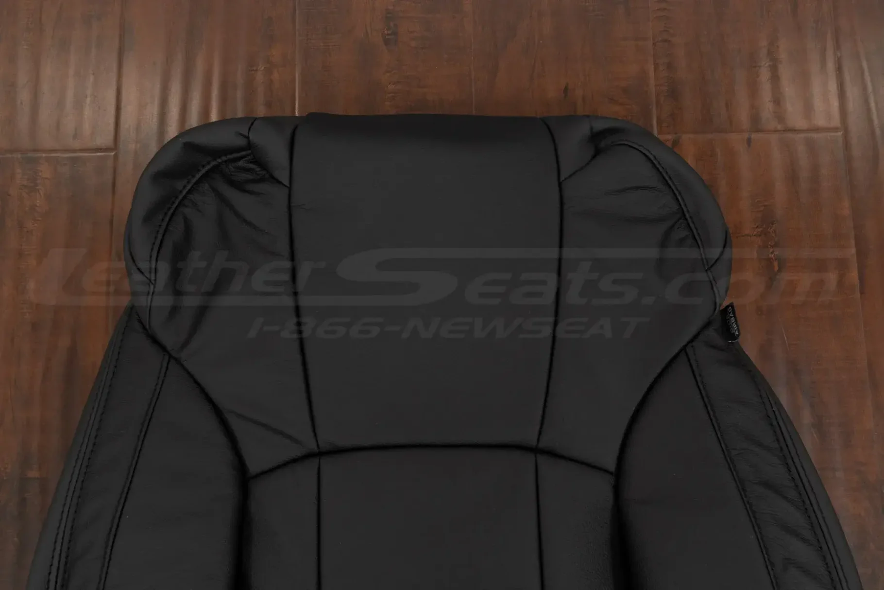 Upper section of leather backrest upholstery