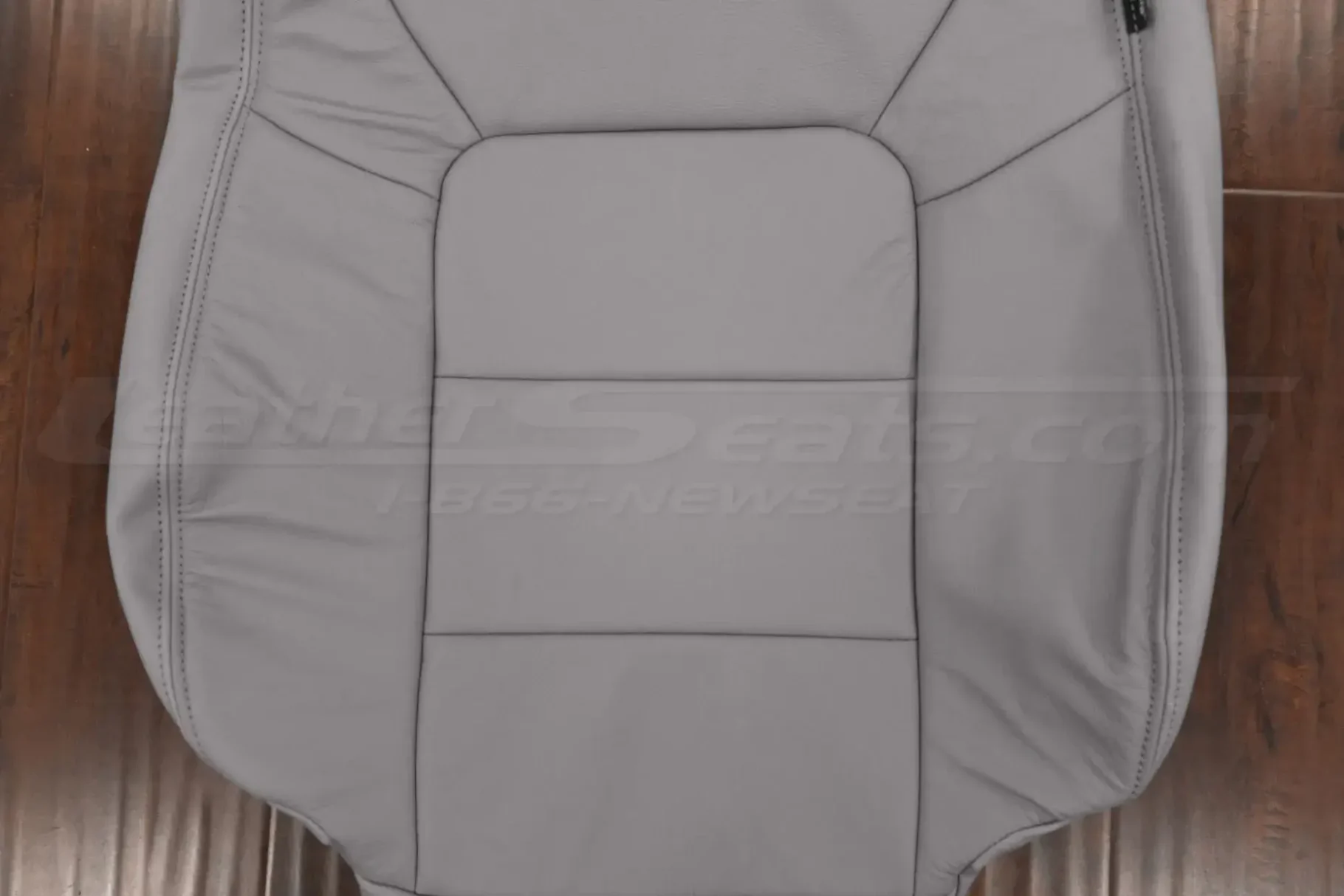 Insert section of grey backrest upholstery