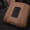 Side view of custom leather console lid cover with wireless charging pad