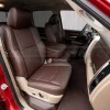 Passenger side of installed Ram leather seats in Coffee with Cream stitching