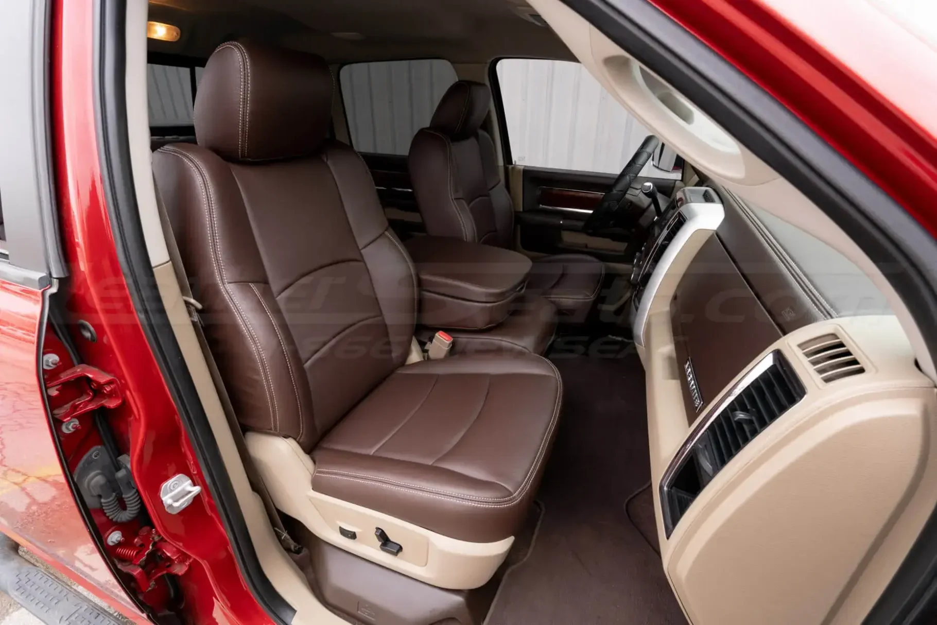Passenger side of installed Ram leather seats in Coffee with Cream stitching