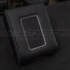 Black leather wireless charging console with white stitching and white trim ring