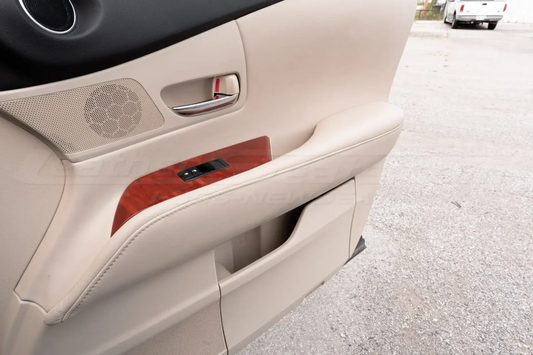 Custom leather door armrest covers installed