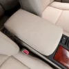 Top-down view from passenger side of installed leather center console lid cover on lexus rx450h