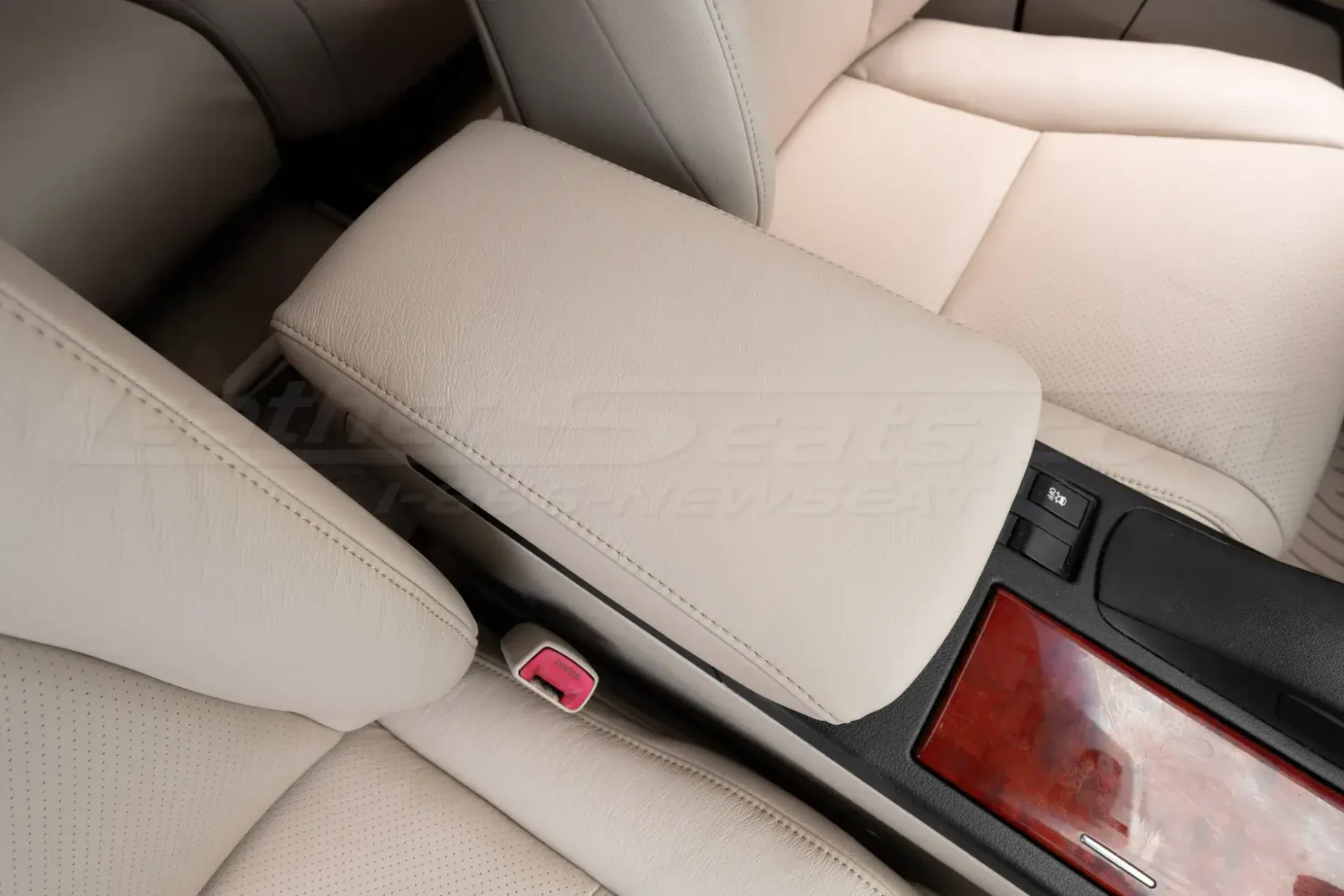 Top-down view from passenger side of installed leather center console lid cover on lexus rx450h