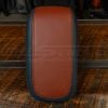 Front view of Ford Maverick leather center armrest cover installed