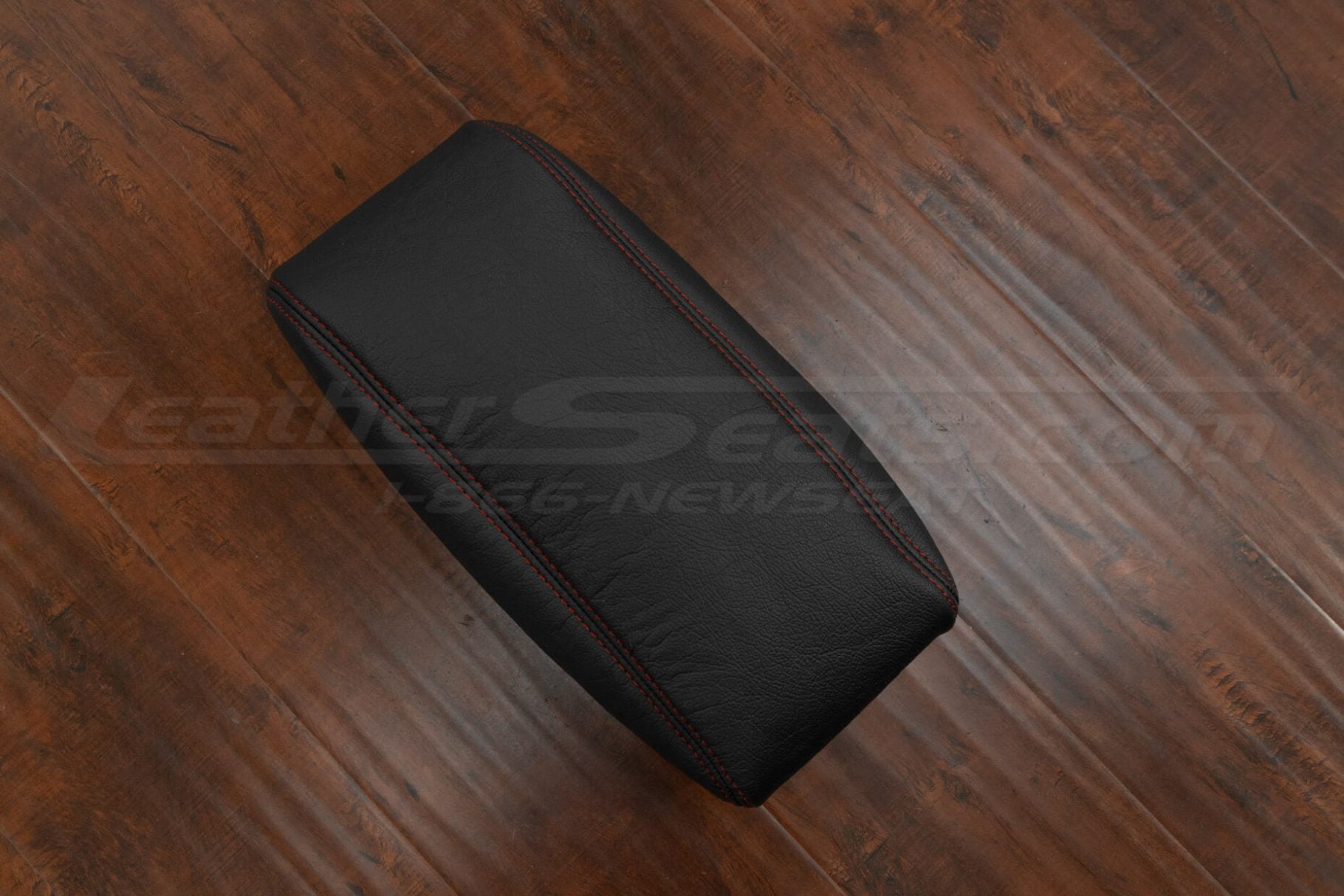 Top-down view of Dodge Durango leather center console lid upholstery