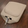 Flat lay of Dodge Ram leather jump seat console