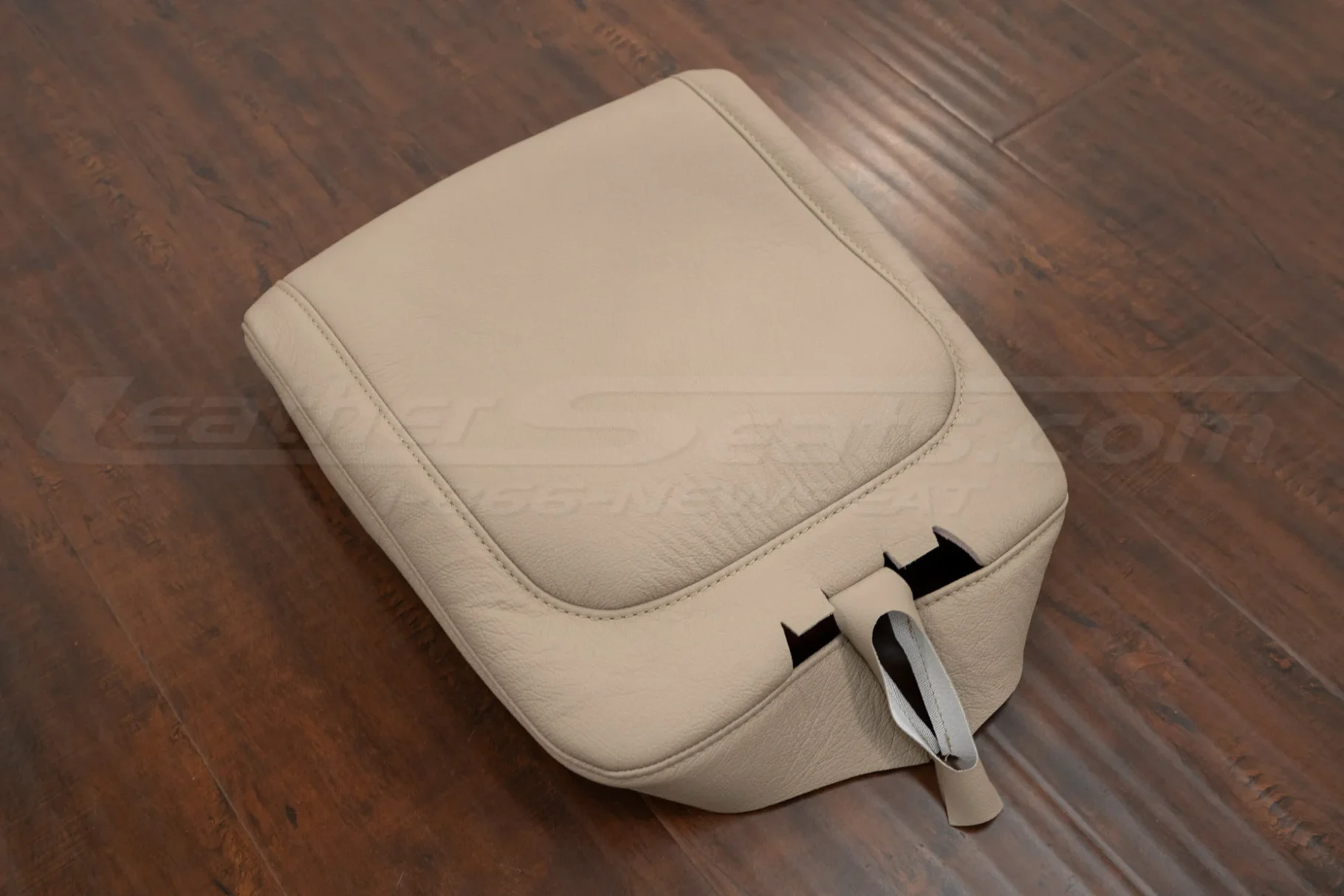 Custom jump seat leather center console cover in ivory