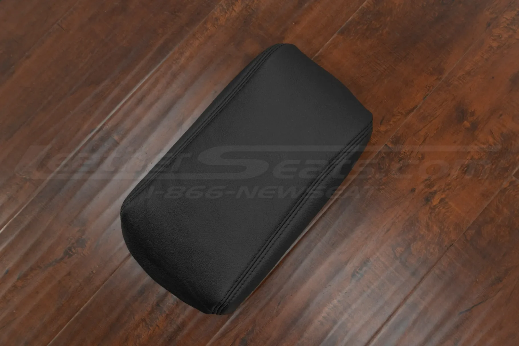 Top-down side view of leather upholstery for Ford Explorer center console
