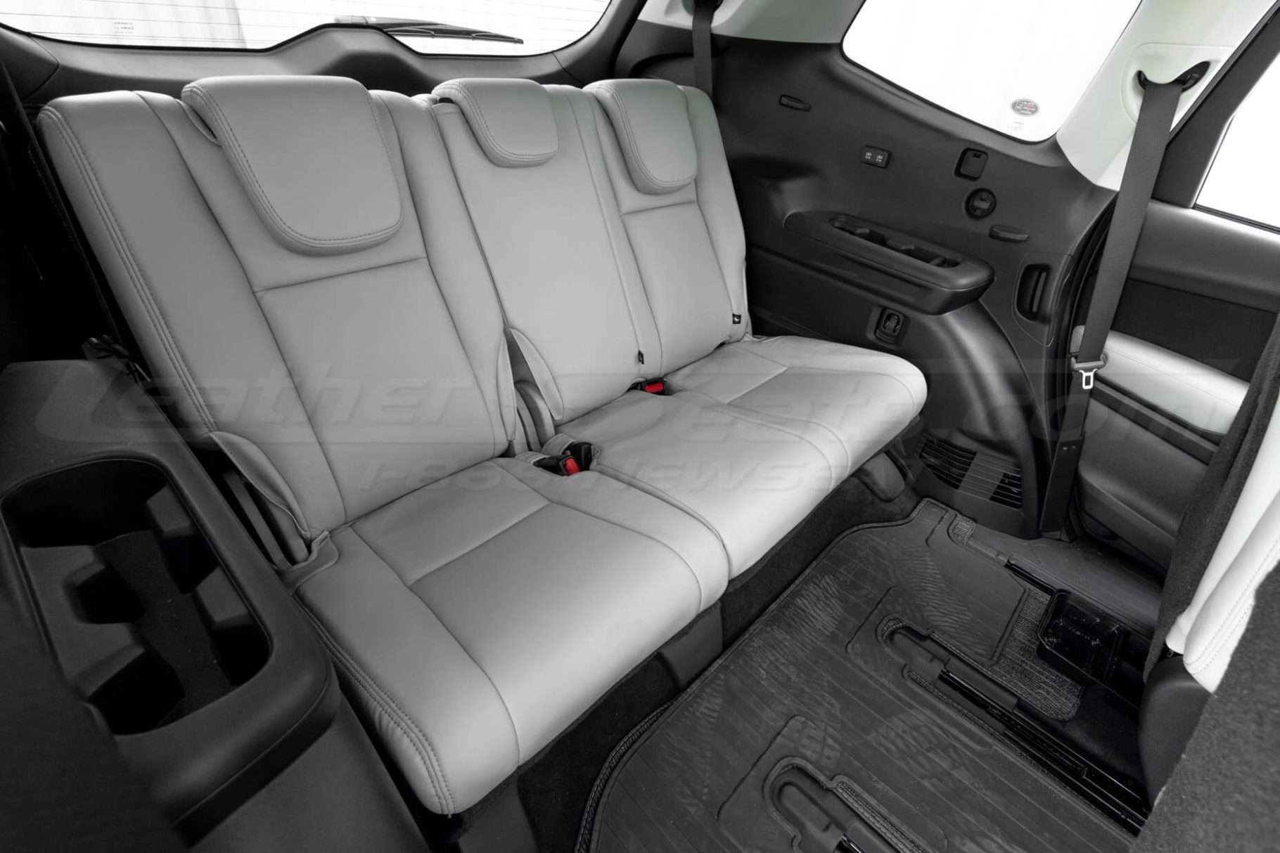 Passenger side view of Subaru Ascent aftermarket leather seats installed third row