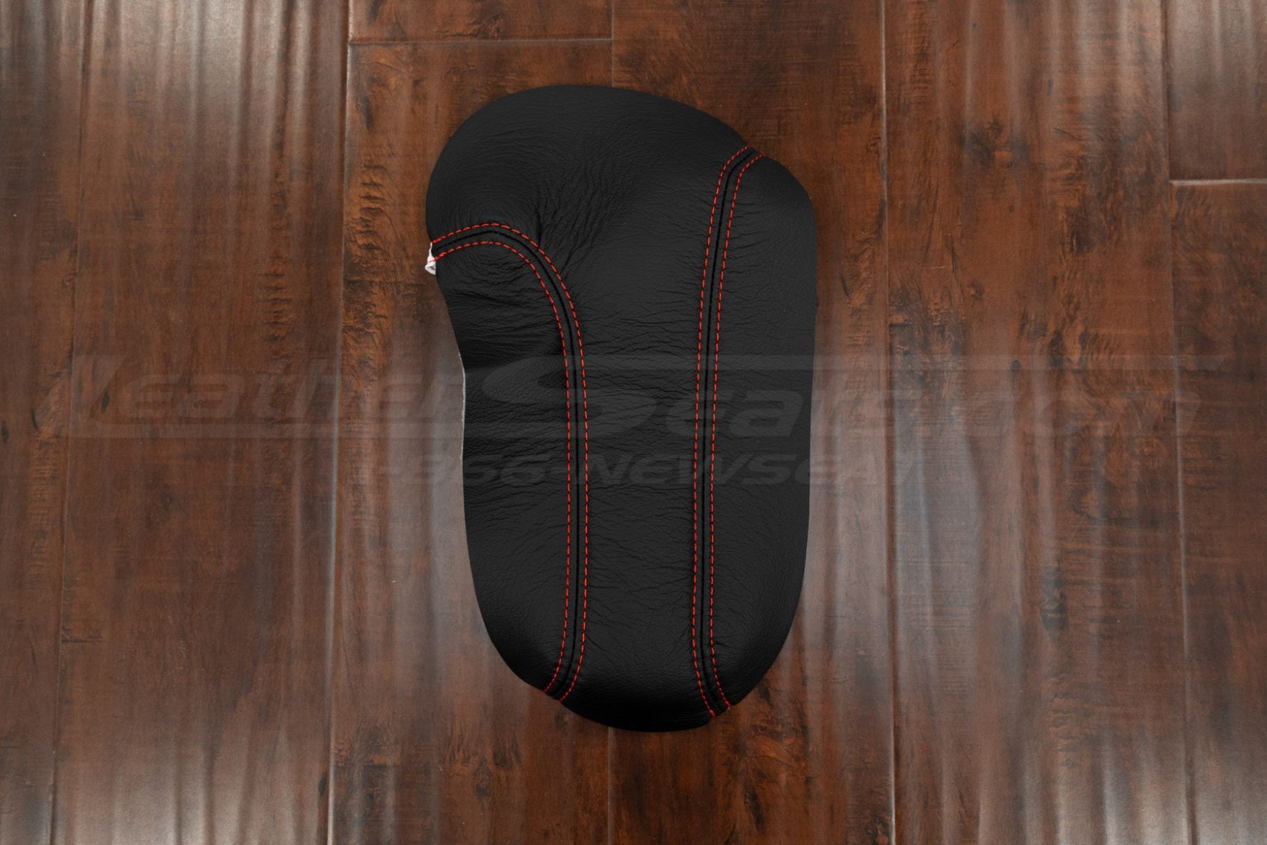 Black SSR center console upholstery with bright red stitching