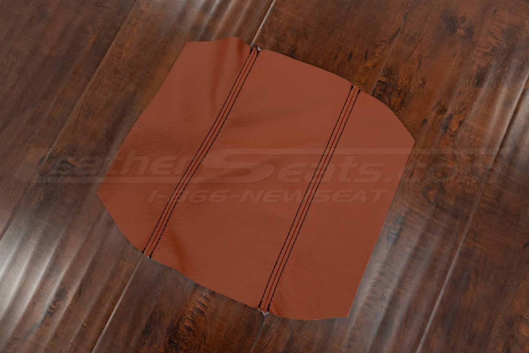 Flat lay upholstery of aftermarket leather center console lid