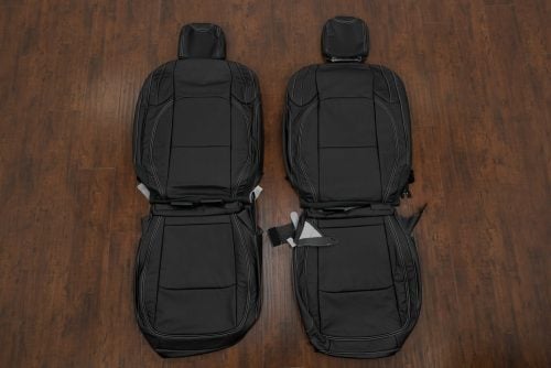 JL Wrangler aftermarket black leather seats with silver stitching