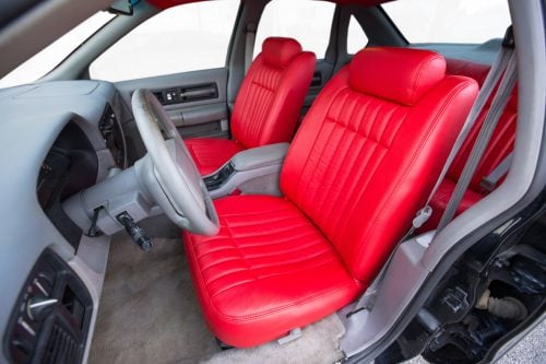 Aftermarket Bright Red Chevrolet Impala SS leather seats installed