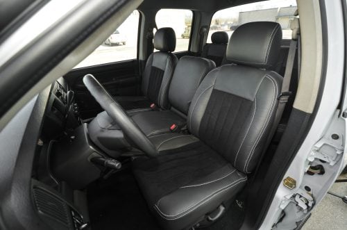 Dodge Ram installed leather seats with black synthetic suede