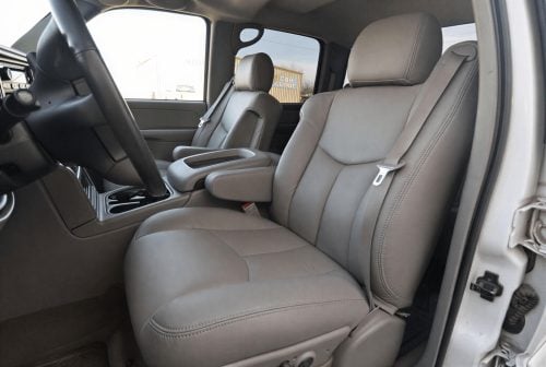 2003-2007 GMC Sierra with installed smoke replacement leather seat covers