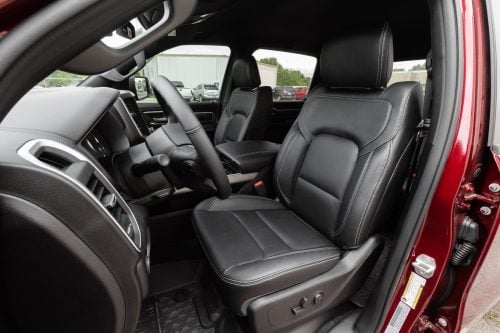 Ram 1500 with installed black leather seats - driver side