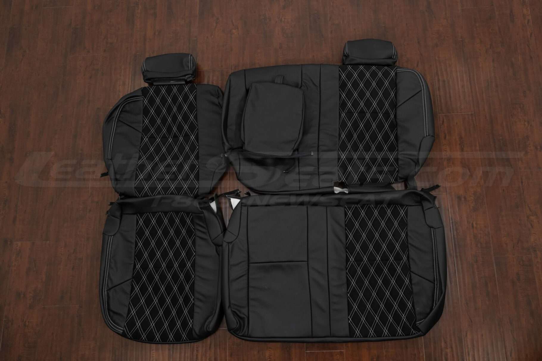 2007-2013 GMC Sierra Black and Black Suede replacement leather seat covers with double-diamond stitching in white