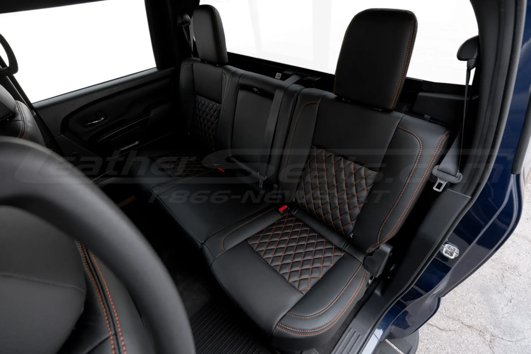 Nissan Titan custom black diamond quilted leather seats installed - Rear seats