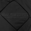 Black perforated insert section close-up