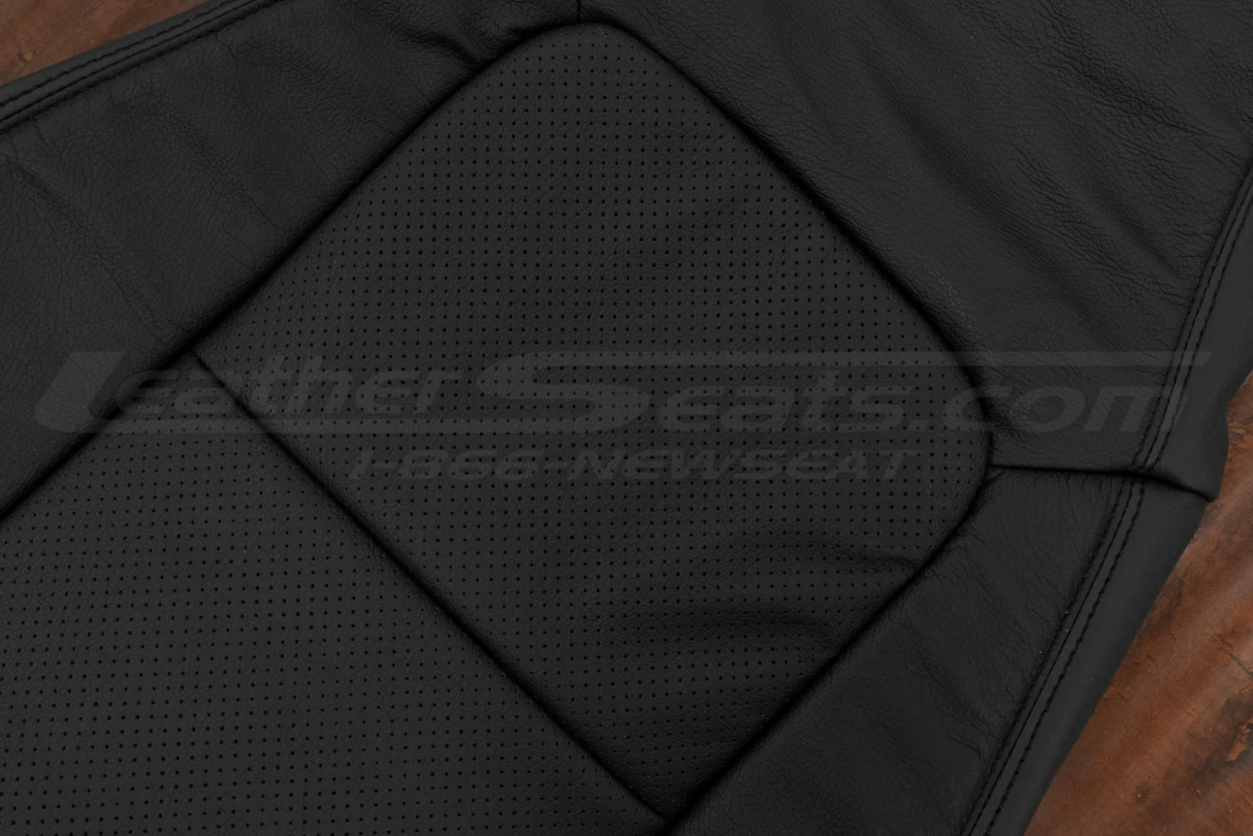 Black perforated insert section close-up