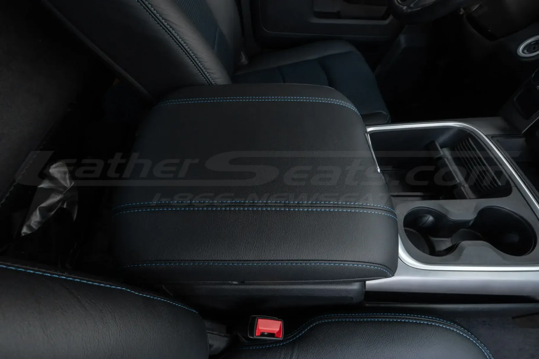 Black Ram Classic leather console with contrast blue stitching