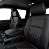 Medium shot of Black diamond quilted replacement leather seat covers installed in Nissan Titan