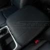 Dodge Ram Classic custom black leather console cover installed with blue stitching