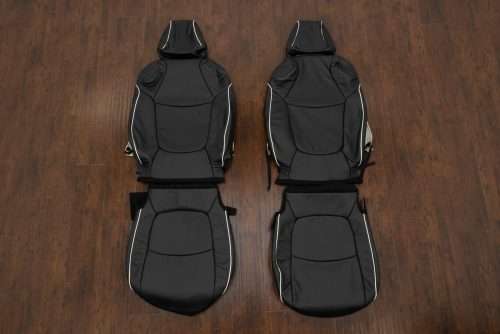 Toyota RAV4 black replacement leather seat covers with White Piping