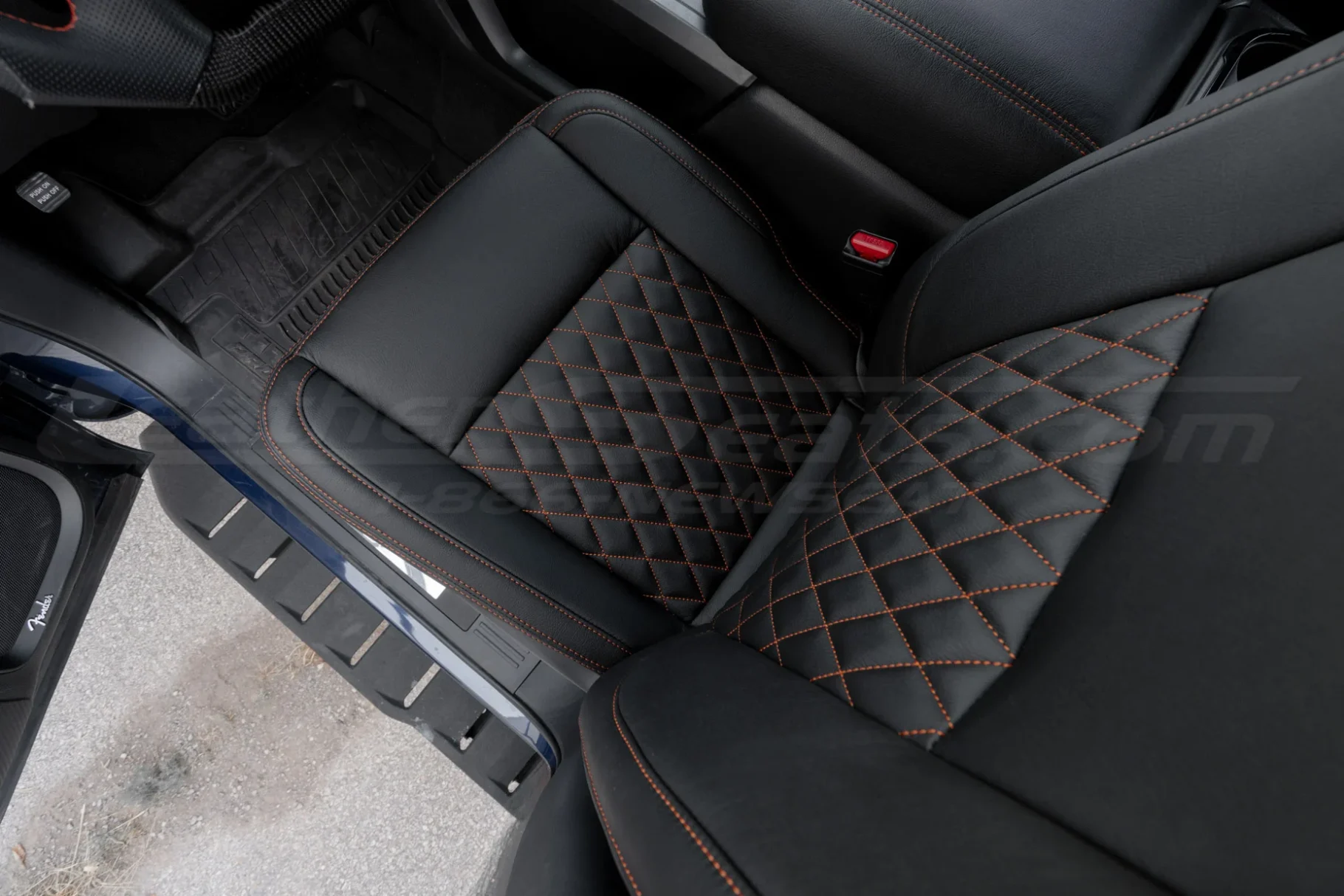Top-down view of installed Nissan Titan custom leather seats