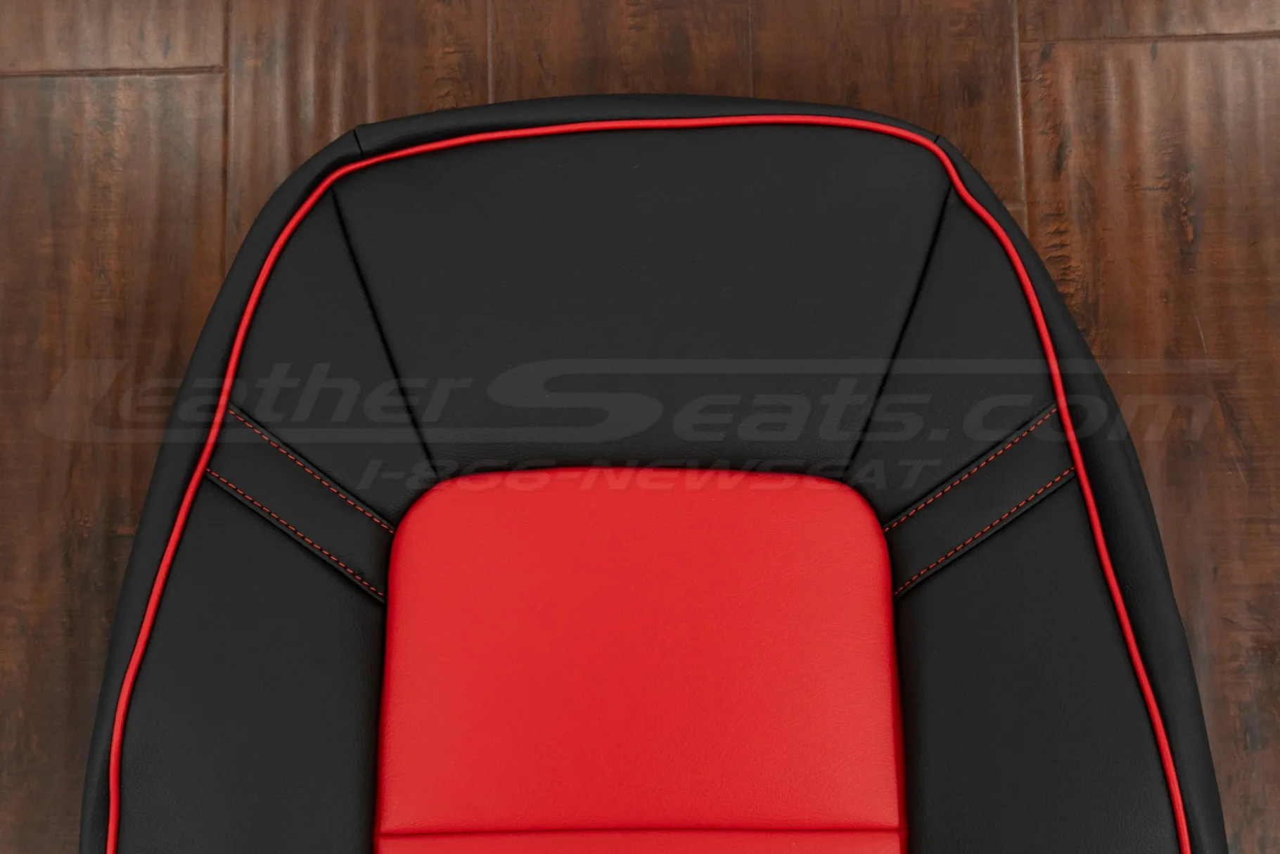 Upper section of two-tone leather backrest upholstery
