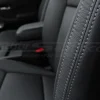 Contrasting Stone double-stitching on Dark Graphite leather close-up