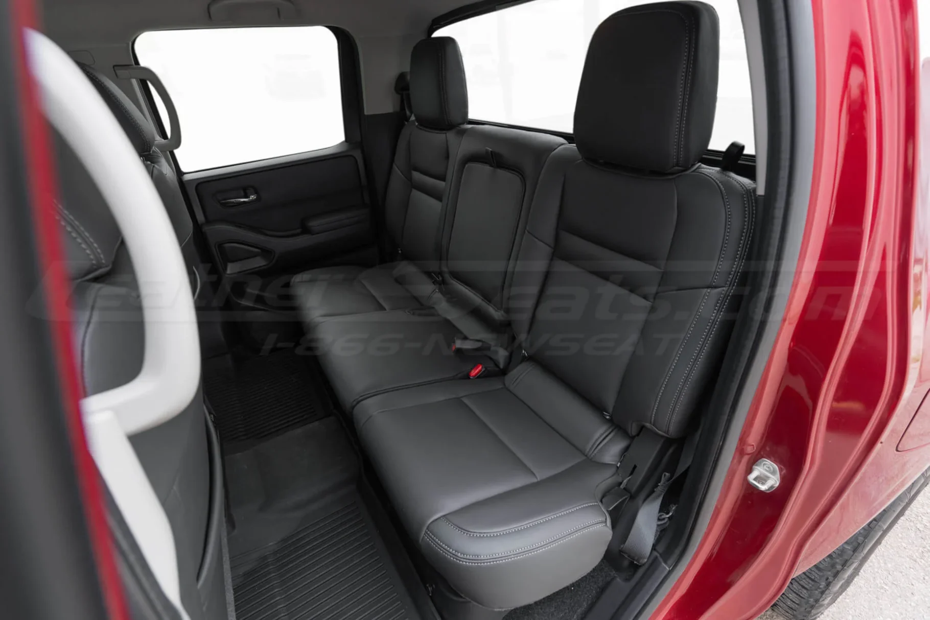 Dark Graphite rear leather seats installed in Nissan Frontier