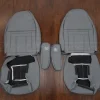 Front seat Crater Grey leather upholstery with armrests flipped